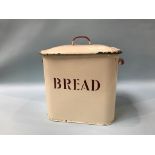An enamel bread bin