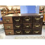 A set of 1920's oak filing drawers, with 12 small drawers, 67cm wide, 42cm height, 36cm deep