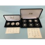 Two silver proof coin sets, approximately 101 grams