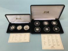 Two silver proof coin sets, approximately 101 grams