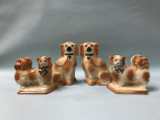 Two pairs of Staffordshire dogs