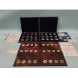 Six plated sets of coins and medallions