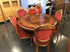 An Italian style circular table and six chairs