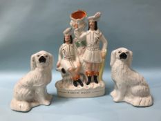 A Staffordshire flatback, 'Robin Hood', and a pair of Spaniels
