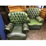 Two green leather Chesterfield armchairs