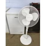A John Lewis chest freezer and electric fan