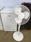 A John Lewis chest freezer and electric fan