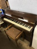 A Deco Spence miniature piano and piano stool