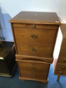 A pair of Stag bedside chests, with brushing slides