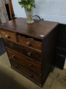 A mahogany chest of drawers and a large fire screen