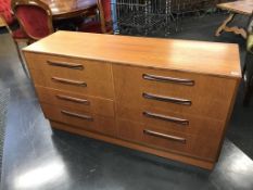 A teak G Plan 'Fresco' double chest of drawers, having eight drawers, 142cm wide