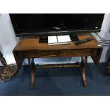 A reproduction mahogany leather inset sofa table