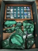 A collection of carved malachite and semi-precious stones