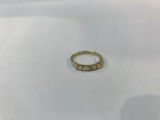 A 9ct gold diamond five stone ring