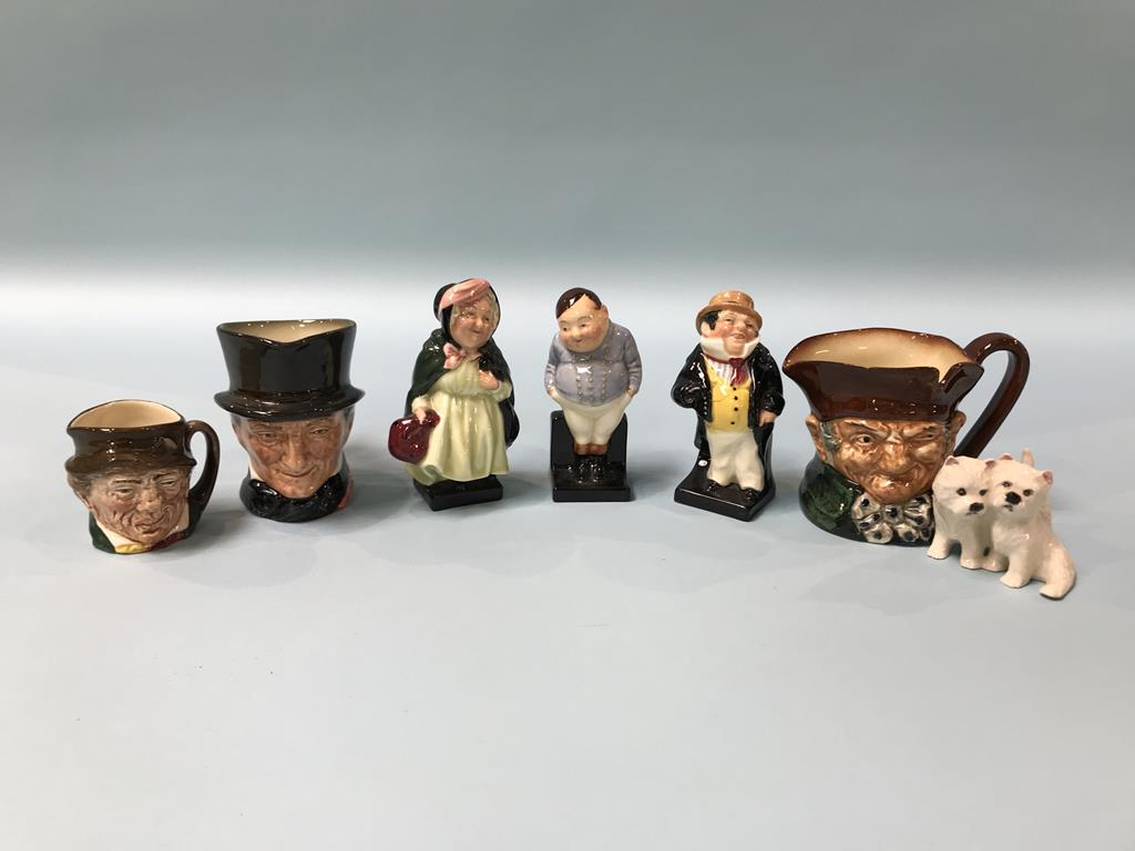 A collection of Royal Doulton character jugs, Dickens figures etc.