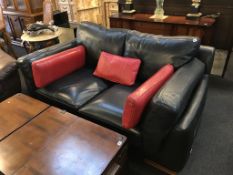 An Incanton Italian black leather settee
