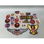 A collection of vintage cloth patches, to include Honda and Harley Davidson etc.