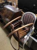 A reproduction mahogany bureau, grey armchair and rocking chair