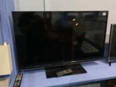 A Panasonic TV and remote