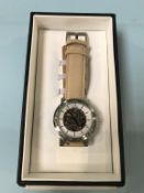A boxed Weird Ape men's kolt steel bezel skeleton face watch and spare strap, as new