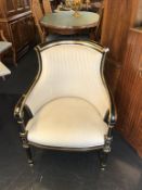 A Regency style black and gilt chair
