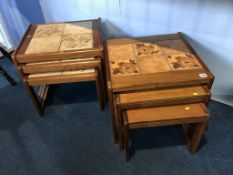 Two teak and tiled nest of tables