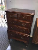 A reproduction mahogany chest of drawers, 64cm wide