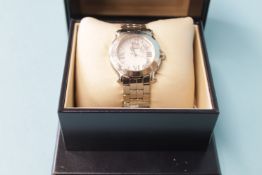 A Chopard 'Happy Sport' stainless steel wristwatch, with white dial and seven moving diamonds, boxed