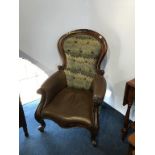 A Victorian mahogany spoon back armchair