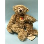 A Steiff 'Snobby' Teddy Bear, with yellow tag, number 028267, golden mohair, with chest tag and