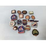 A collection of seventeen enamel badges, to include Butlins etc.