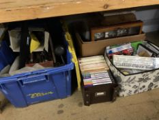 A shelf of assorted DVDs etc.