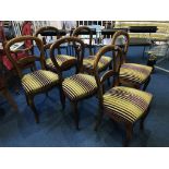 A set of six mahogany dining chairs