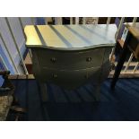 A small serpentine chest of two drawers, 79cm