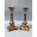 A pair of Royal Crown Derby Old Imari candlesticks, pattern 1128, 27cm height