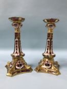 A pair of Royal Crown Derby Old Imari candlesticks, pattern 1128, 27cm height