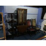 Two American rocking chairs, three oak pub tables, leaded glass cabinet and gateleg table
