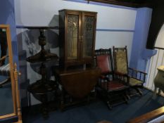 Two American rocking chairs, three oak pub tables, leaded glass cabinet and gateleg table