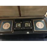 A pair of modern maritime oils and two framed coin prints