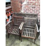 A teak garden bench and a pair of armchairs