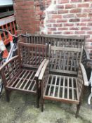 A teak garden bench and a pair of armchairs