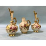 A pair of Worcester ewers and a flat back jug (3), 19cm height and 13cm height