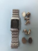 A gents Armani wristwatch and two pairs of silver cufflinks