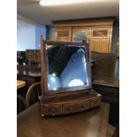 A 19th century mahogany bow front dressing table mirror, 58cm wide