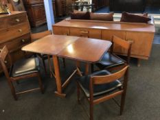 A teak dining room suite comprising; sideboard, gateleg table and four chairs