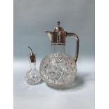A silver mounted decanter and oil bottle