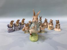 A collection of Royal Albert and Beswick Beatrix Potter figures