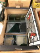 A quantity of stained glass panels