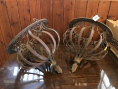 A pair of decorative metalwork hanging baskets, 27cm diameter