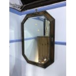 An oak framed mirror